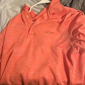 Greg Norman collared shirt.